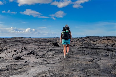 hiker on paehoehoe seashore.jpg